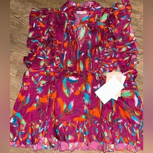 Alivia brand new flutter sleeve top! Stunning!